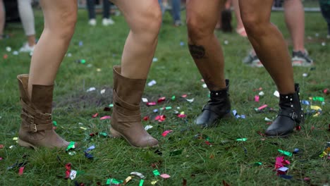 Low-section-of-dancing-friends-at-Holi-Festival.