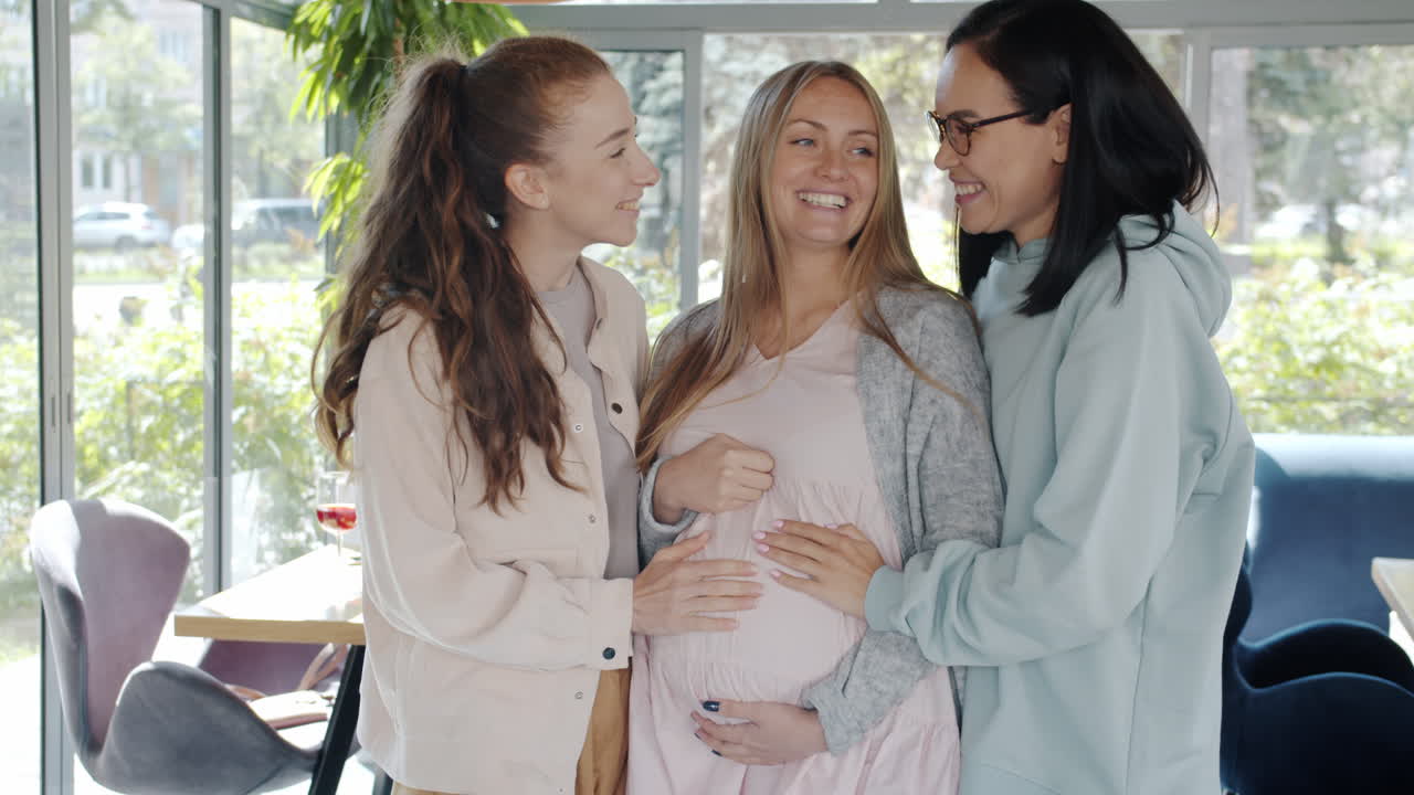Friends Support Pregnant Woman