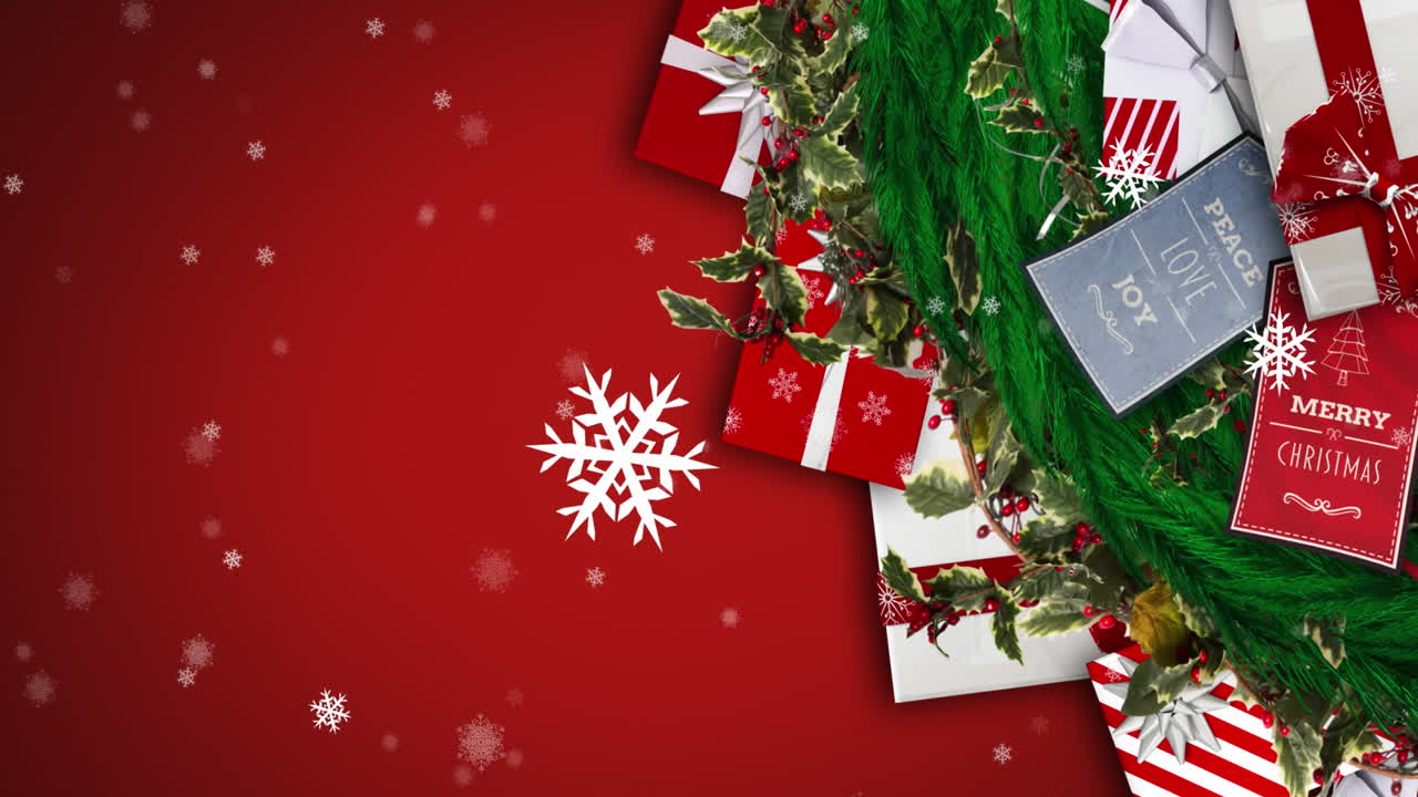 animación de regalos de navidad y decoraciones y nieve cayendo sobre fondo rojo