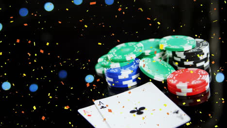 digital composite of tokens and cards falling on the floor with confetti and bubble animation