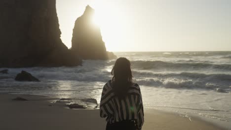 woman at the beach sunset