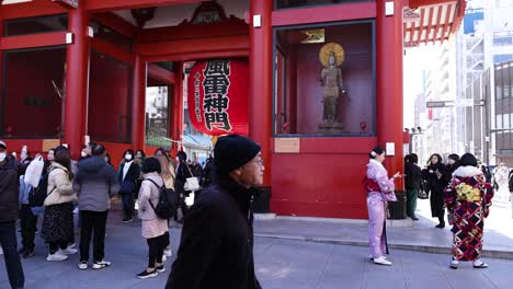 visitors exploring the iconic sensoji temple gate