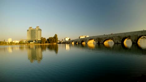 ancient roman two-thousand-year-old stone bridge in the center of the turkish city of adana