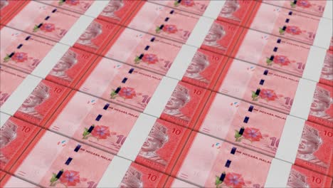 10 malaysian ringgit banknotes printed by a money press