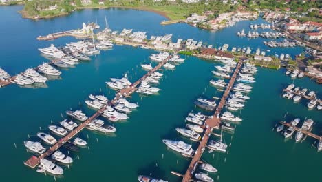 bird's eye view of yacht and boats moored at the casa de campo marina in summer in dominican republic