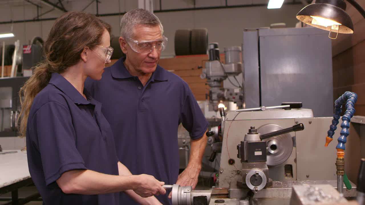 Engineer Training Female Apprentice On Lathe Shot On R3D