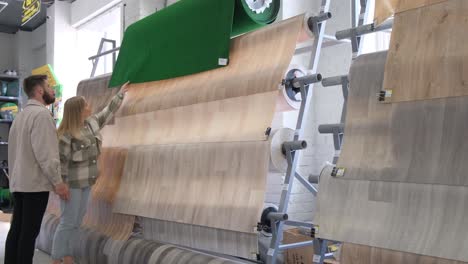 couple shopping for flooring in a retail store