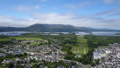 Left-to-right-panning-view-of-tourist-town-of-Killarney,-the-lakes-and-renowned-macgillycuddy-reeks-and-carrauntouhill-known-locally-as-'Heavens-Gate