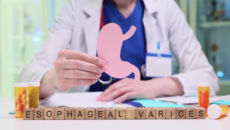 doctor explaining esophageal varices with anatomical model