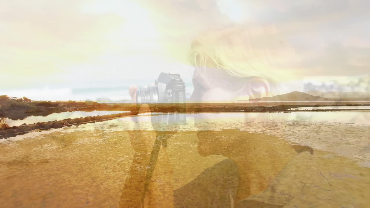 Photographer shooting coastal salt flat scene with tidal pool reflections and golden sunset overlay