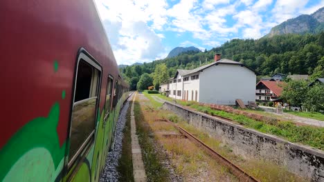 travelling by train across the bohinj line in slovenia