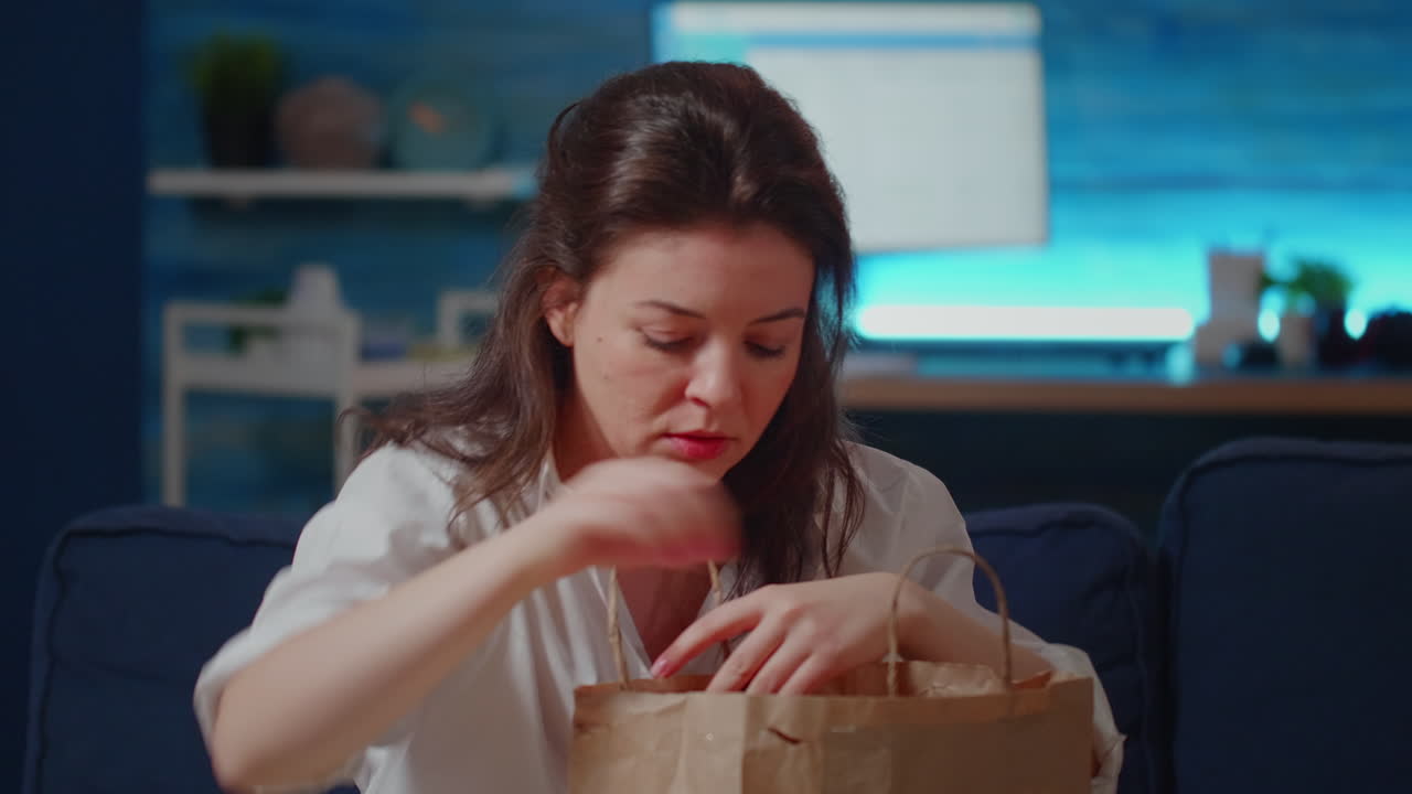 Close up of businesswoman with takeaway food order