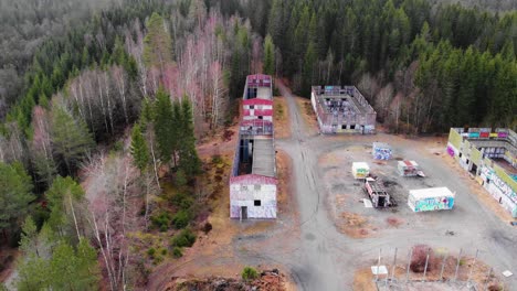 Aerial-top-down-of-empty-Bockaby-Urban-Warfare-Facility-Area-in-Sweden,-Urbex-scene