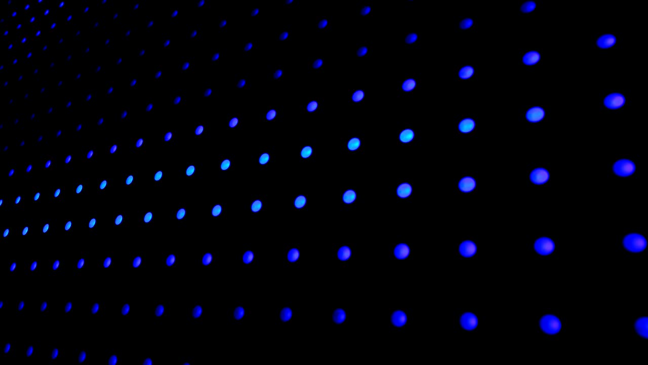 애니메이션과 함께 추상적인 배경 이동 디지털 led 빛 점은 이벤트, 콘서트 또는 프레젠테이션에서 표시되는 제목을 위해 빛납니다.