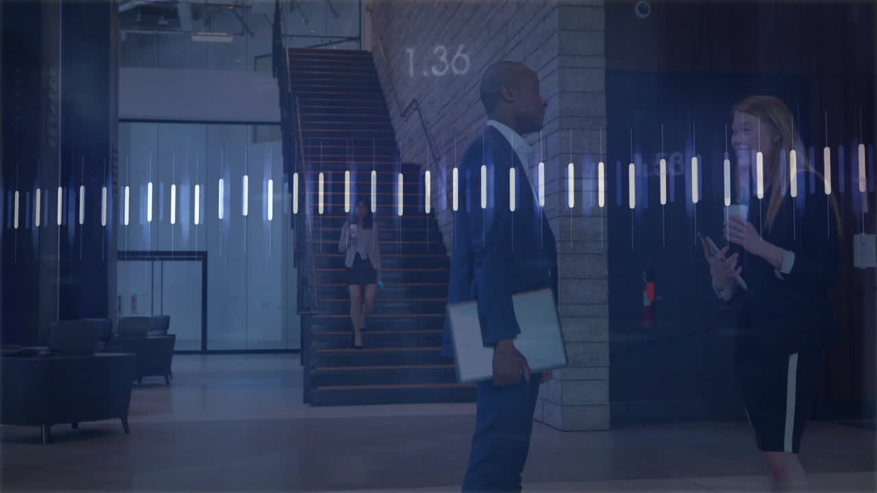 businesswoman descending stairs while viewing smartphone in lobby showing business chart animations