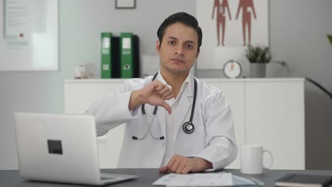 Disappointed-Indian-doctor-showing-thumbs-down