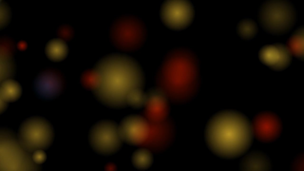 Abstract Background of Floating Golden and Red Bokeh Lights