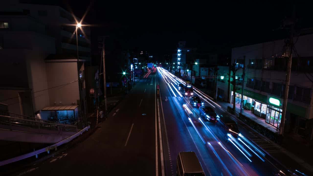도쿄 시내 거리의 교통체증의 야간 타임스 화면