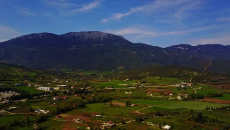 Scenic-Aerial-Shot-of-Latsoudi-and-Landscape-Along-Road-EO48-near-Livadias-Amfissas-Expressway-in-Greece