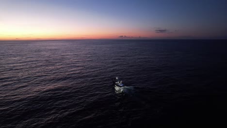 tuna fishing boat fishing at night in the atlantic ocean, azores