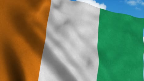 ivory coast flag waving in the wind, blue sky background. 4k