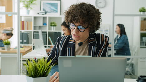 diverse call center team working in office