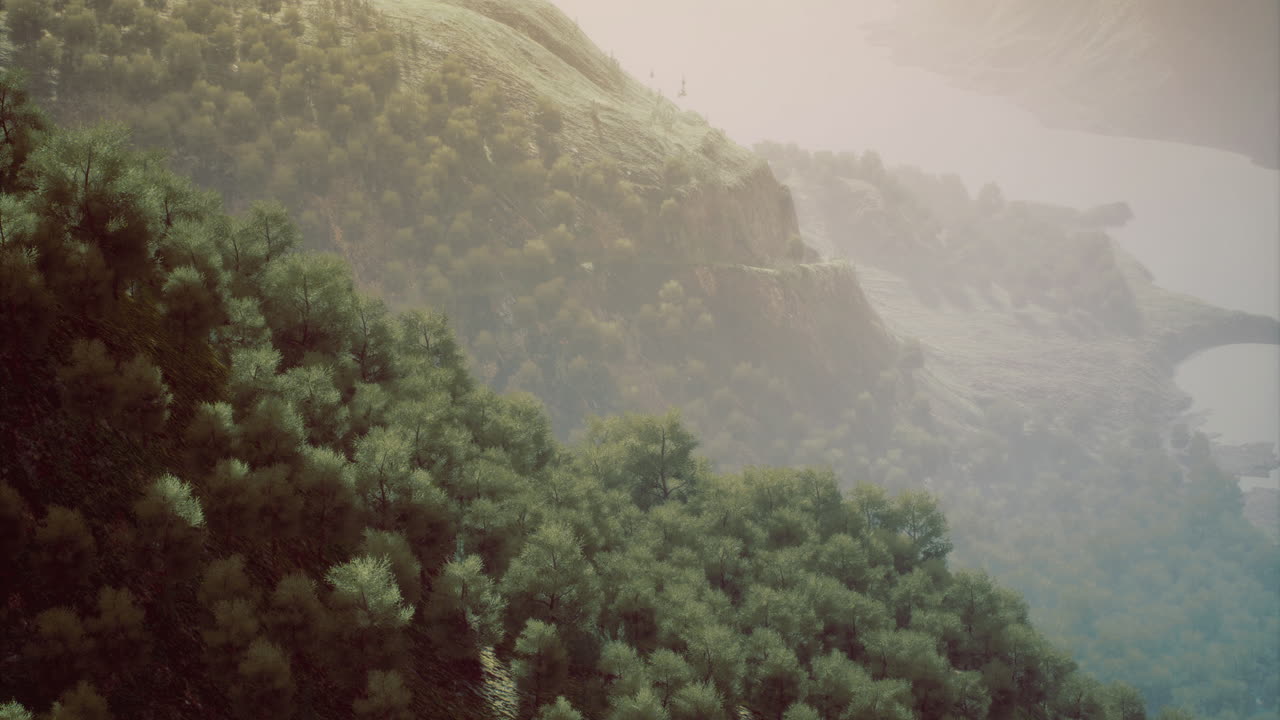 Majestic view of lush hills overlooking a winding river at dusk