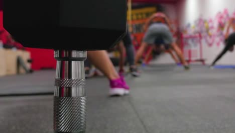 group worming up in gym box