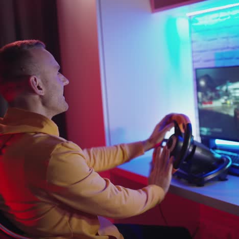young gamer sitting at home
