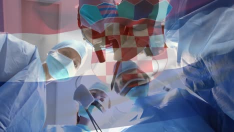 animation of flag of croatia waving over surgeons in operating theatre