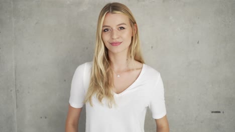 smiling woman in white t-shirt