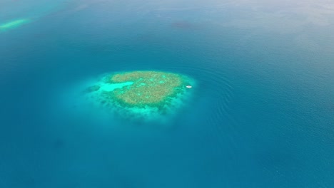 Aerial-View-of-Kayak-by-Coral-Reefs-in-Maldives-Island-Arhipelago,-Indian-Ocean,-Exotic-Tropical-Destination,-Drone-Shot
