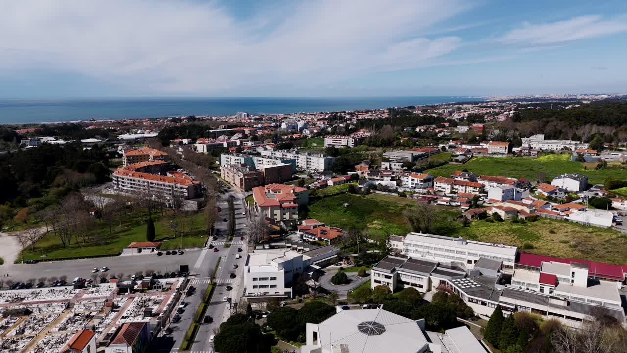 Aerial Igreja Matriz de Arcozelo with view to ocean in Gaia Portugal