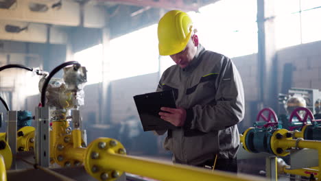 worker with hardhat at the factory