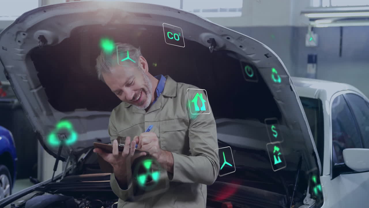 Male mechanic leaning on car writing on clipboard in auto garage, with animated green energy icons