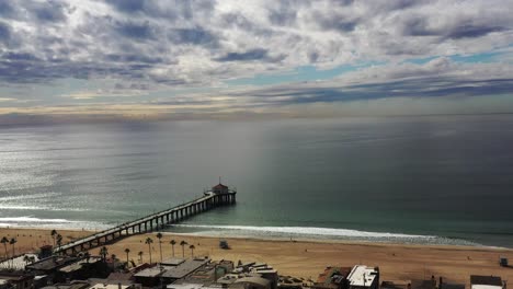 Cloudy-Sunset-Sky-Over-Manhattan-Beach-Pier-And-Pacific-Ocean-In-California,-USA