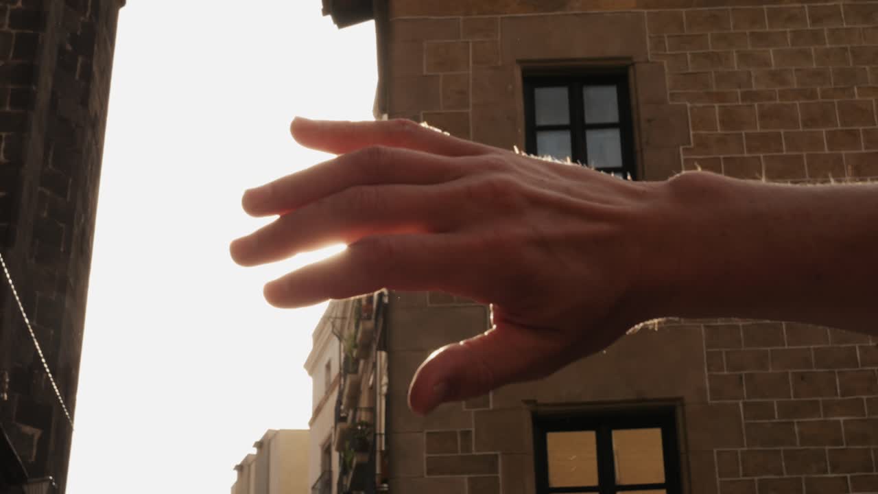 Travel freedom a concept, Close up of traveler man hands closeing sun shine with sunrise in summer, sunset