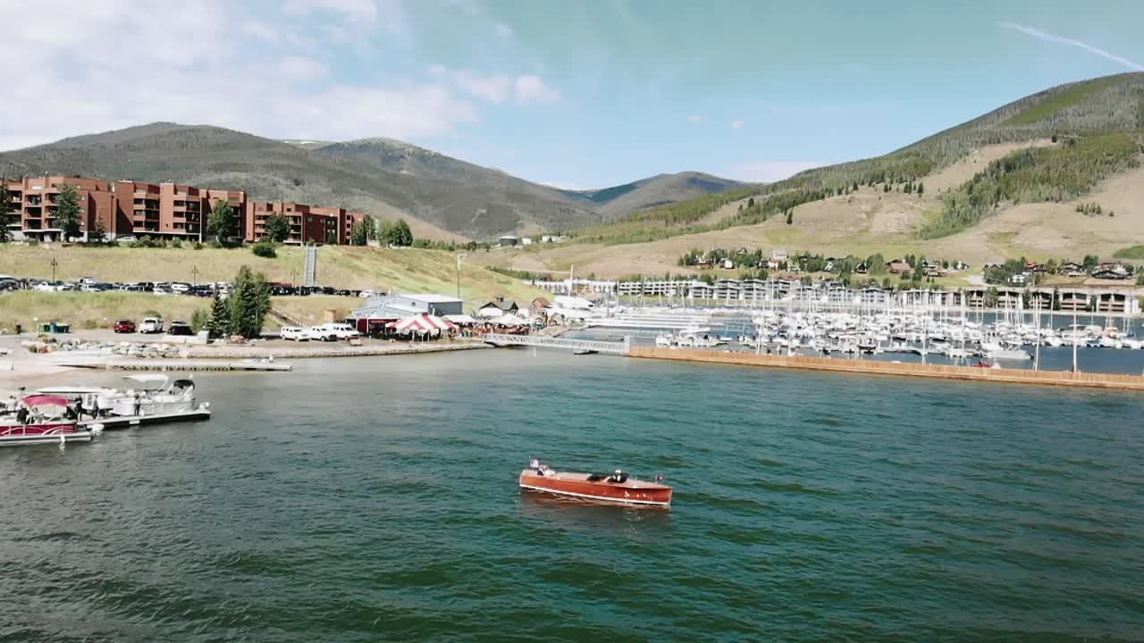 Slow dolly in shot of the marina at Dillon Reservoir, Silverthorne, Colorado. USA.