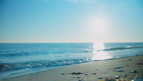 waves at the beach on a sunny day