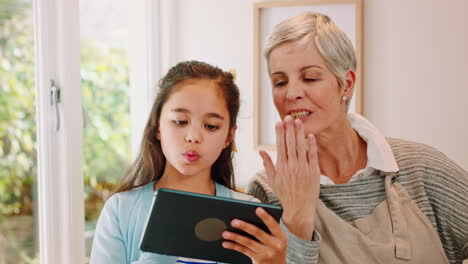 Video-call,-grandmother-and-girl-with-tablet