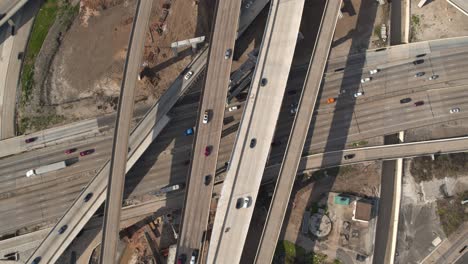 Birdseye-view-of-cars-on-59-and-610-South-Freeway-in-Houston,-Texas