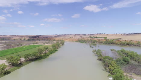 aerial shot rising over the beautiful and vast river murray on a stunning day in rural south australia