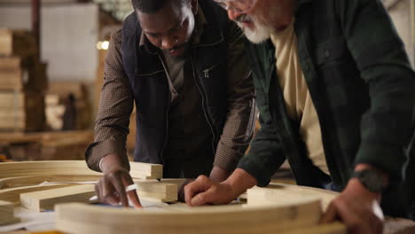 woodworkers collaborating on a project