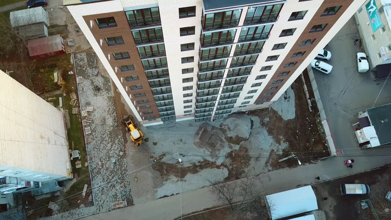 New house construction. Large apartment buildings construction in new district