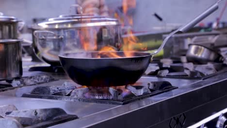 Flaming-Frying-Pan-On-Stove