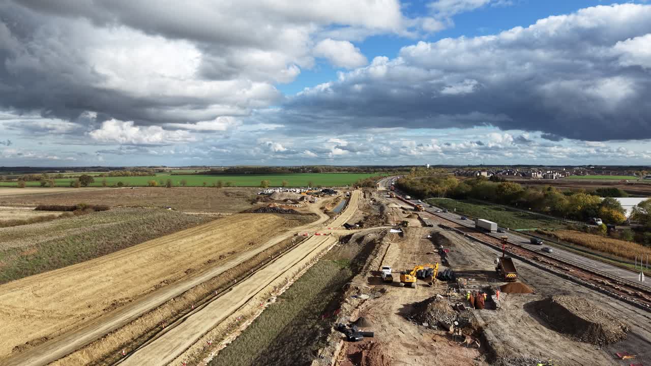 Diggers at work A428 highway road upgrade Cambridgeshire UK drone,aerial