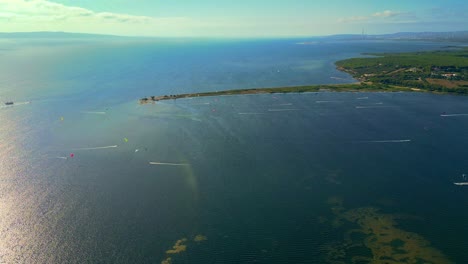 Water-sport-enthusiasts-at-Punta-Trettu,-San-Giovanni-Suergiu,-Sardinia