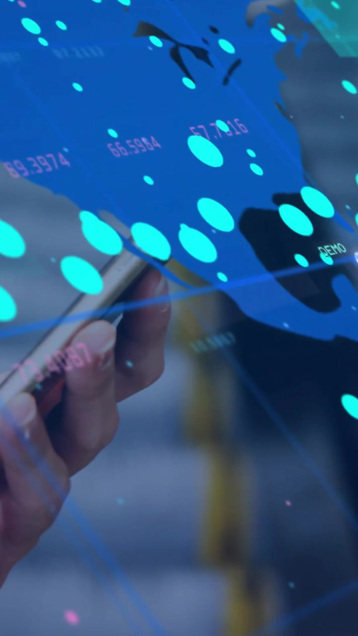 Vertical video: Woman holding phone in transit hub tapping live map data display for route info