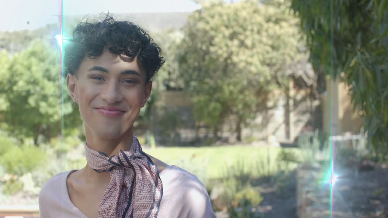 Male model turning head and smiling as camera tightening, sunlight creating lens flare for branding