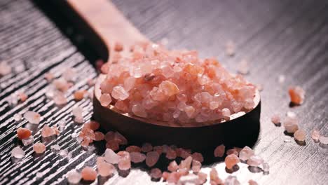 himalayan pink salt in a wooden is used to flavor food. due mainly to marketing costs, pink himalayan salt is up to twenty times more expensive than table or sea salt.